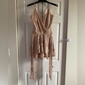 A’GACI TRAC Lace Surplice Skort Romper